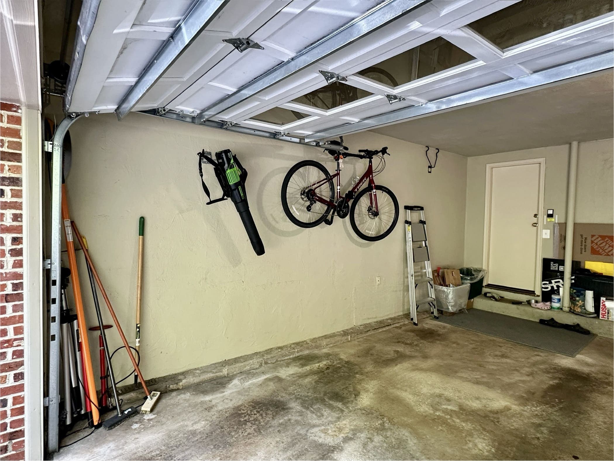 Starting to get some stuff out. Clearing the space is the first step toward your new garage. We work with you to move or set aside anything that needs to stay, then make room for the new system.
